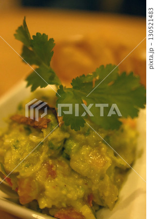 mexican food with tacos guacamole and nachos 130521483