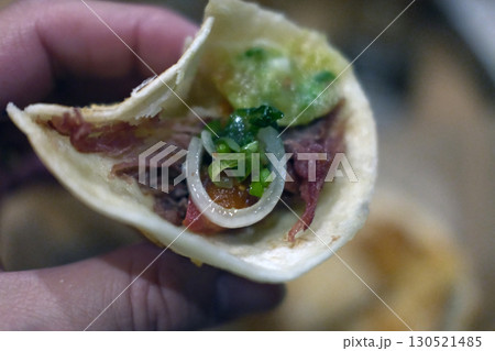 mexican food with tacos guacamole and nachos 130521485