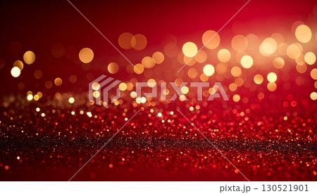 赤い背景に輝くゴールドの光と幻想的なキラキラグリッター 赤い背景に輝くゴールドの光と幻想的なキラキラグリッター 130521901