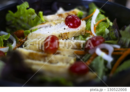 Fried Chicken Fillet And Fresh Vegetable Salad In A Bowl 130522008