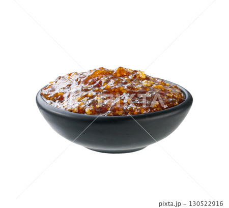 figs jam in a black bowl isolated on white background. figs jam in a black bowl isolated on white background. 130522916