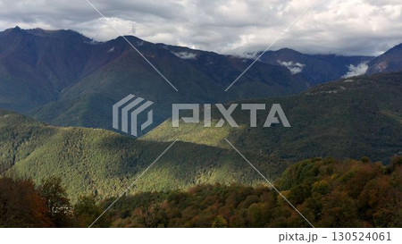 Aerial Drone Footage View: Flight over autumn mountain village with forests, fields and river in sunrise soft light. Beautiful mountains in autumn. Beauty world. 4K Aerial Drone Footage View: Flight over autumn mountain village with forests, fields and river in sunrise soft light. Beautiful mountains in autumn. Beauty world. 4K 130524061