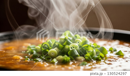 Steaming Hot Soup with Green Onions Steaming Hot Soup with Green Onions 130524297