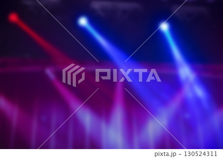 Blurry multicolored rays from the stage lighting. Blurry multicolored rays from the stage lighting. 130524311