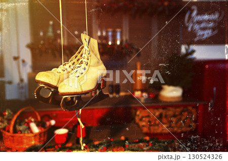 Vintage Christmas background with scratches and scuffs with old retro skates. 130524326