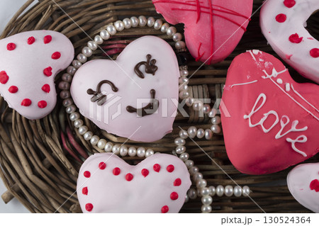 Beautiful pink gingerbread or heart shaped cookies. Sweet edible valentine's day gift. 130524364