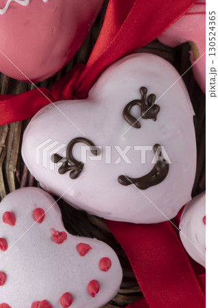 Beautiful pink gingerbread or heart shaped cookies. Sweet edible valentine's day gift. 130524365