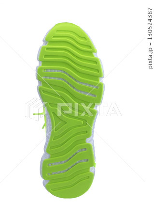 Sole of green sneaker on white background 130524387