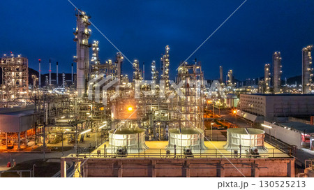 Aerial view oil and gas refinery plant at night, Global business energy logistic transportation, Oil and gas refinery petrochemical industrial, Petrochemical refinery industrial energy supply chain. 130525213