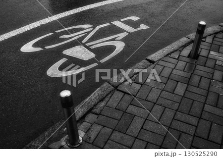 Urban Bicycle Lane in Rainy Weather Urban Bicycle Lane in Rainy Weather 130525290