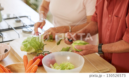 Elderly couple preparing fresh vegetables together 130526573