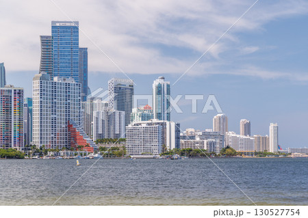 Modern skyline of Miami with towering skyscrapers, tropical vibe, and waterfront views Modern skyline of Miami with towering skyscrapers, tropical vibe, and waterfront views 130527754
