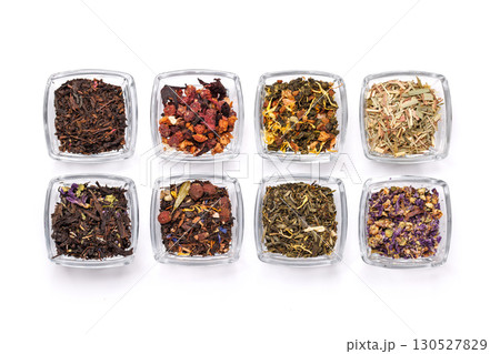 An assortment of various dry tea leaves, showcasing different textures, colors, and blends An assortment of various dry tea leaves, showcasing different textures, colors, and blends 130527829
