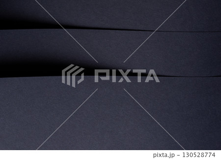 Minimalistic navy blue paper texture with a deep, dark backdrop. Elegant, modern, and trendy style 130528774
