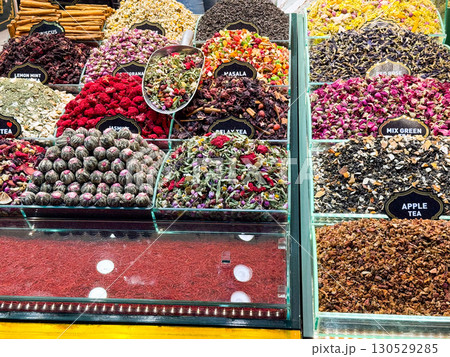 Display of teas and dried fruits in a market. Tradition, flavor, and culture in natural food products. 130529285