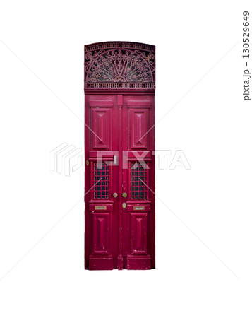 Vintage double door painted in deep burgundy with intricate wood paneling and ornate wrought iron Vintage double door painted in deep burgundy with intricate wood paneling and ornate wrought iron 130529649
