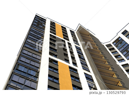 Low angle view of a tall condominium building with modern architecture, white and grey facade, and 130529793