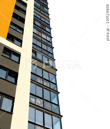 Modern high rise residential building with sleek black window frames and large reflective glass Modern high rise residential building with sleek black window frames and large reflective glass 130529809
