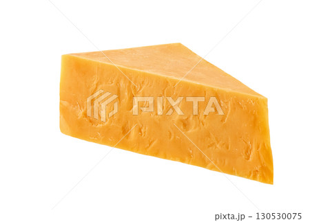 piece of cheddar cheese isolated on a white background. 130530075