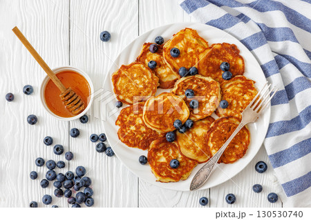 fried hot and crispy pancakes with blueberries 130530740