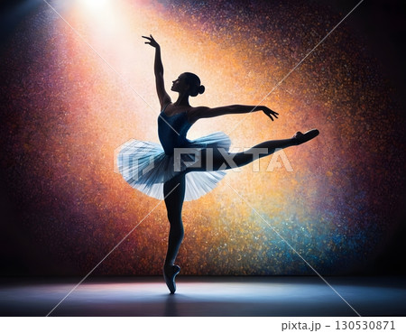 Silhouette of ballerina in graceful dance pose with glowing spotlight, cinematic elegant stage scene 130530871