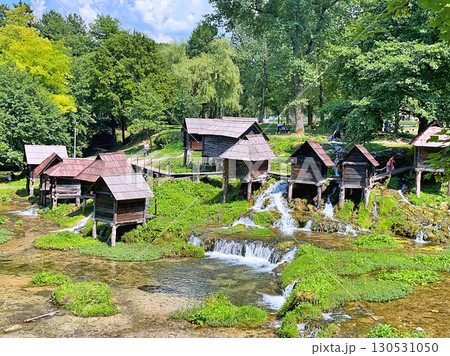 A group of disused mini wooden watermills (known as Mlincici) located on Pliva Lake (Plivska Jezera) near Jajce, Bosnia and Herzegovina 130531050