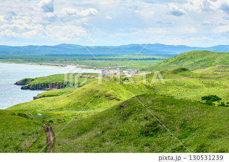 The nature of the Khasansky district of Primorsky Krai, Russia. The lip of the Teal of the Slavic Bay, the inner bay of Peter the Great in the summer. The nature of the Khasansky district of Primorsky Krai, Russia. The lip of the Teal of the Slavic Bay, the inner bay of Peter the Great in the summer. 130531239