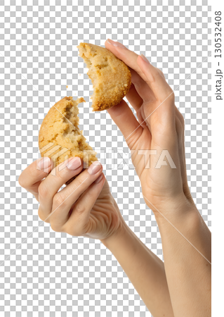 Close-up of hands snapping cookie in half, homemade dessert concept Close-up of hands snapping cookie in half, homemade dessert concept 130532408