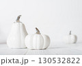 Minimalist White Pumpkins on White Wooden Background 130532822