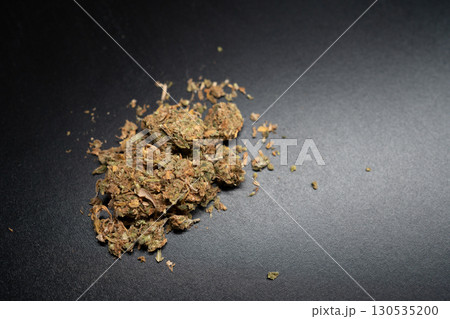 Dried Cannabis Flower on Dark Surface Ready for 130535200
