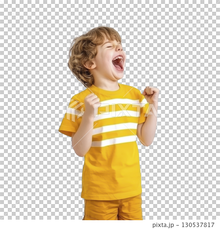 A young boy in yellow striped shirt and shorts is joyfully celebrating with fists raised, expressing excitement and happiness A young boy in yellow striped shirt and shorts is joyfully celebrating with fists raised, expressing excitement and happiness 130537817