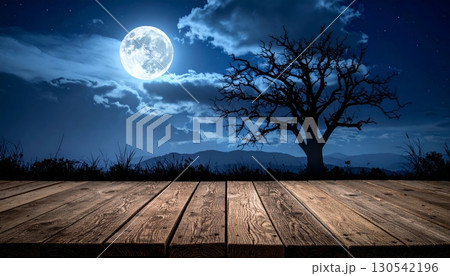 Full moon and bright stars illuminate a dark night sky over a misty blue forest and the sea Full moon and bright stars illuminate a dark night sky over a misty blue forest and the sea 130542196