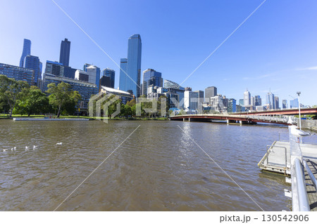 Melbourne, Australia - December 31,2023 : Yarra river view in central Melbourne with Melbourne CBD skyline, Australia on December 31,2023. 130542906
