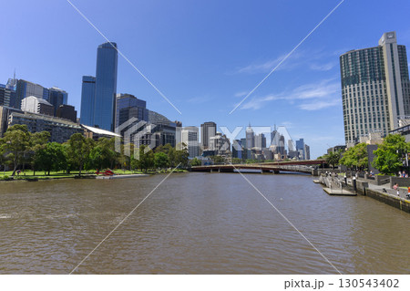 Melbourne, Australia - December 31,2023 : Yarra river view in central Melbourne with Melbourne CBD skyline, Australia on December 31,2023. Melbourne, Australia - December 31,2023 : Yarra river view in central Melbourne with Melbourne CBD skyline, Australia on December 31,2023. 130543402