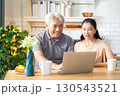Asia happy senior elderly couple hugging and embrace at living room.  130543521