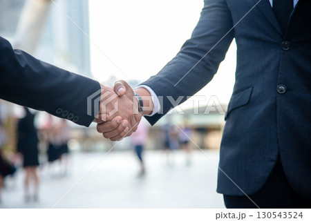 Close up hands businessman partner man jolt hands together for start up new Project. Close up hands businessman partner man jolt hands together for start up new Project. 130543524