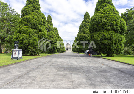 Melbourne, Australia - December 30,2023 : View of the Shrine of Remembrance with people and tourists with clear blue sky in Melbourne, Australia on December 30,2023. 130543540