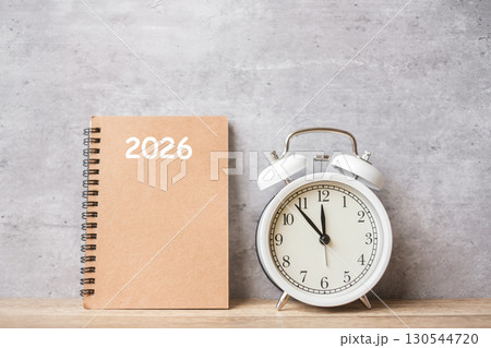 Happy New Year with vintage alarm clock and 2026 calendar. Christmas, New Start, Resolution, countdown, Goals, Plan, Action and Motivation Concept 130544720