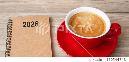 2026 notebook and coffee cup on wood table, Top view and copy space. Xmas, Happy New Year, Goals, Resolution, To do list, Strategy and Plan concept 2026 notebook and coffee cup on wood table, Top view and copy space. Xmas, Happy New Year, Goals, Resolution, To do list, Strategy and Plan concept 130544748