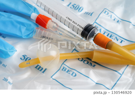 Foley catheter and urine drainage bag collect urine for disability or patient in hospital. Foley catheter and urine drainage bag collect urine for disability or patient in hospital. 130546920