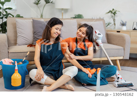 Supportive moments in home cleaning and teamwork. Supportive moments in home cleaning and teamwork. 130548162