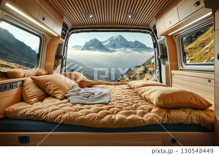 Scenic van life retreat swiss alps interior photography cozy environment panoramic view adventure concept 130548449
