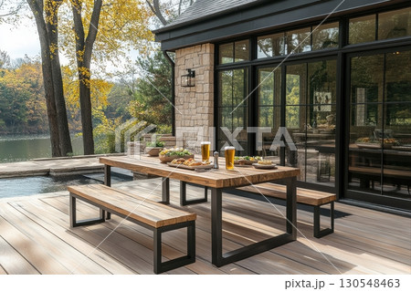 Outdoor dining experience riverside patio food presentation natural setting daytime view relaxation concept 130548463