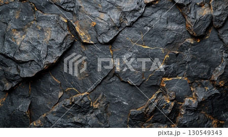 Geological exploration of dark stone textures natural environment close-up abstract concept 130549343