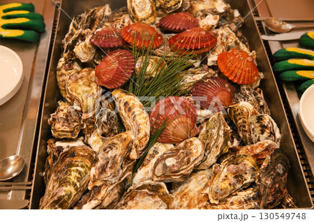 Korean Seafood Food. Steamed oysters and scallops Korean Seafood Food. Steamed oysters and scallops 130549748