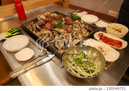 Korean Seafood Food. Steamed oysters and scallops 130549751