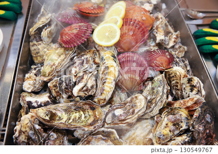 Korean Seafood Food. Steamed oysters and scallops Korean Seafood Food. Steamed oysters and scallops 130549767