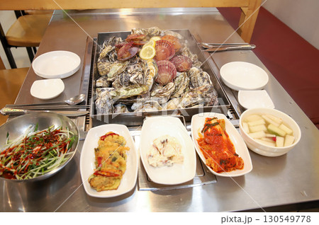 Korean Seafood Food. Steamed oysters and scallops 130549778
