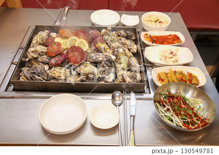 Korean Seafood Food. Steamed oysters and scallops 130549781