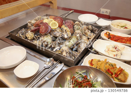Korean Seafood Food. Steamed oysters and scallops 130549786